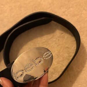 Y2K BEBE Silver Oval Crystal Logo Belt Buckle on Black Leather Belt